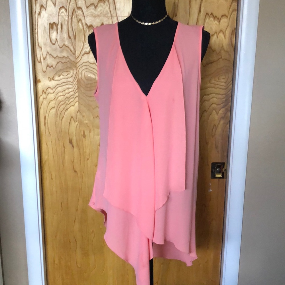 Flowy v neck top. Sleeveless top with long drape neck.